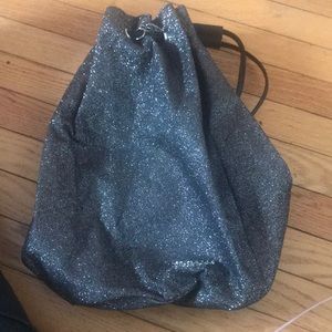 Black and silver Victoria’s Secret string backpack